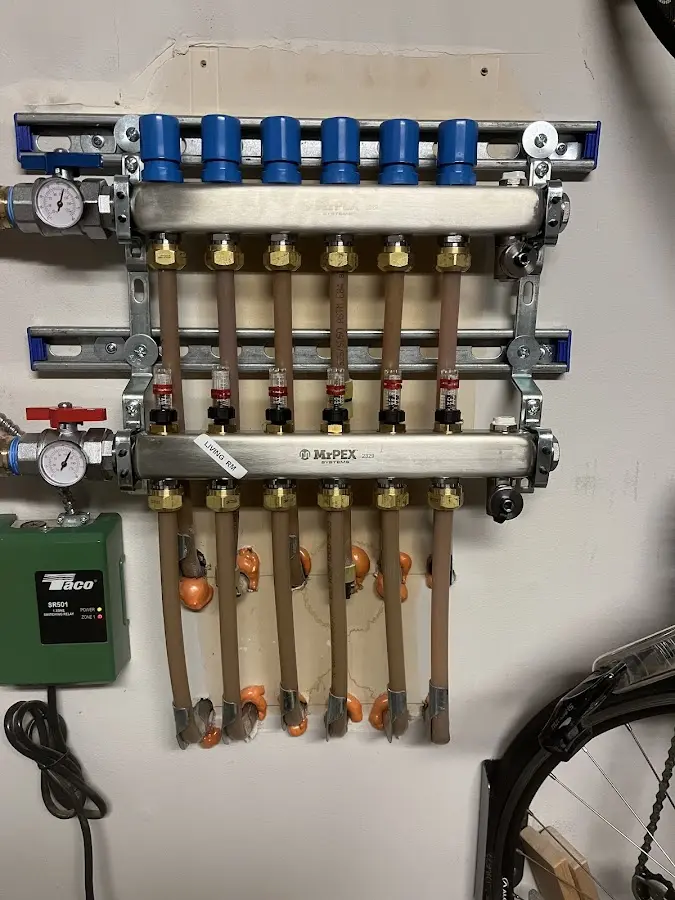 Plumber performing Water Heater Repair at a residential property in Toms River